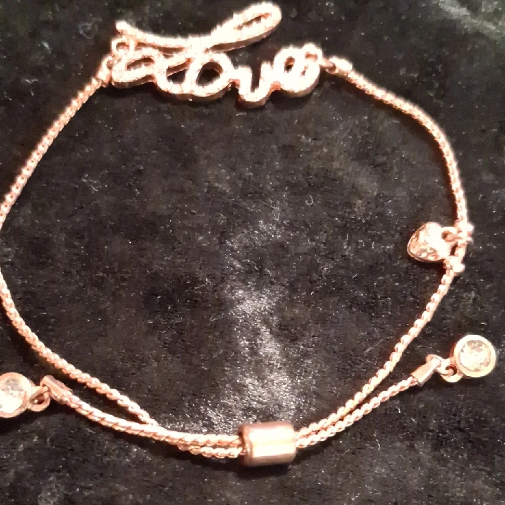 Elegant Rose Gold Love Slide Bracelet.